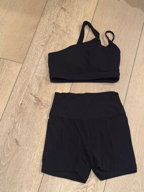 Black Asymmetric Strappy Sports Bra and High-Waist Shorts Set